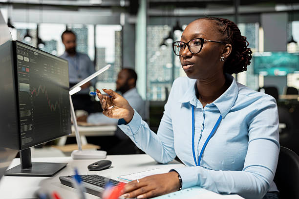 istock Risk analyst monitors live market activity to identify market volatility signs 2231644378