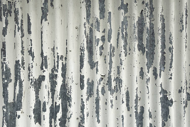 istock White Weathered Corrugated Metal Surface With Peeling Paint. 2231646859