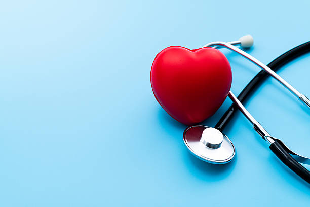 istock Red heart and stethoscope on blue background 2231648774