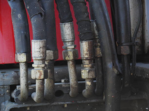 istock Bunch of pipes are connected to a red object 2231649484