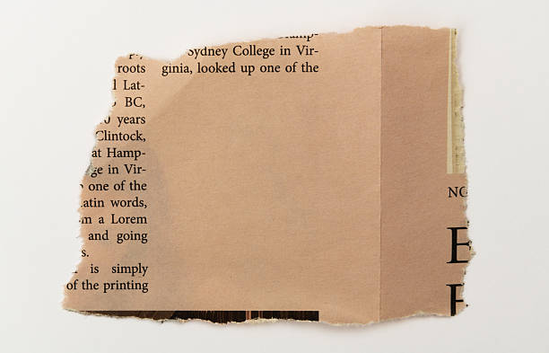 istock Piece of newspaper on white background 2231649529