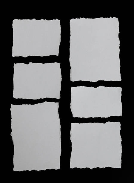 istock Collect white paper sheets on black background 2231649655