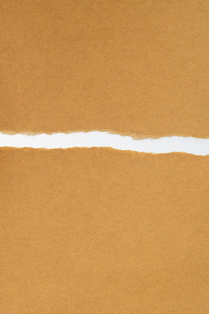 istock Tear out a crack on the brown paper 2231649694