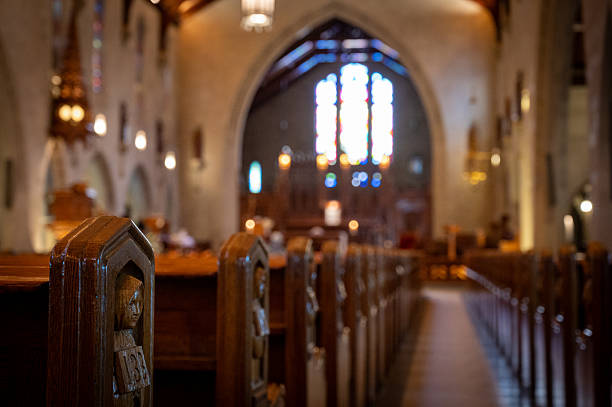 istock Benches in church 2231650032