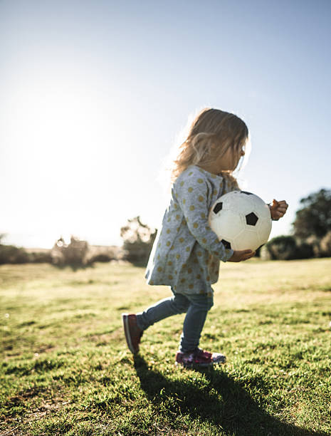 istock little kid running on the park 2231650186