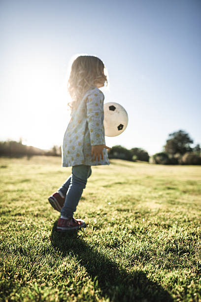 istock little kid running on the park 2231650241