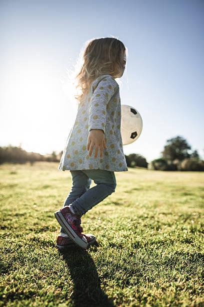 istock little kid running on the park 2231650266