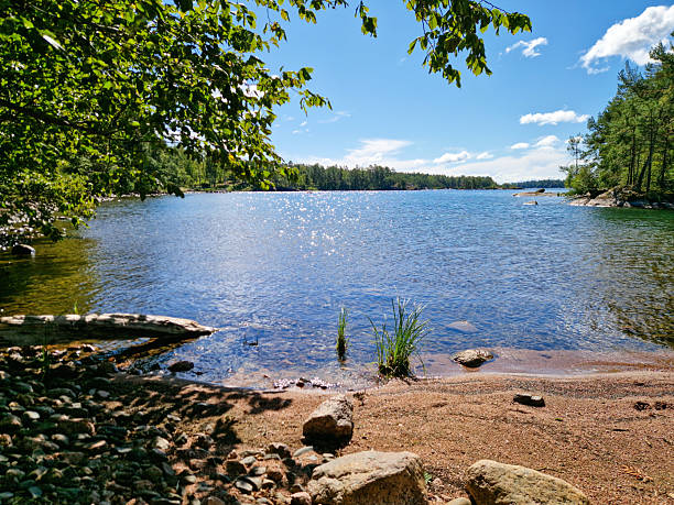 istock Small beach and lake Vattern in Sweden 2231657754
