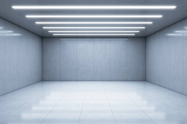 istock Empty modern concrete room with LED ceiling lights and glossy tiled floor, perfect for product presentation or branding mockup backdrop template. 3D Rendering 2231658023