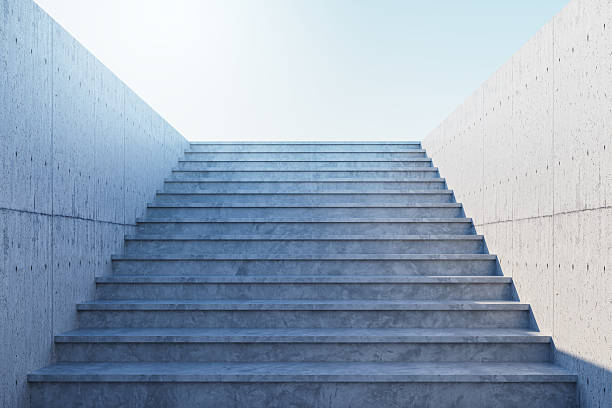 istock Concrete staircase ascending towards bright sky with minimal walls, symbolizing growth, ambition, and leadership in business or personal goals. 3D Rendering 2231658072