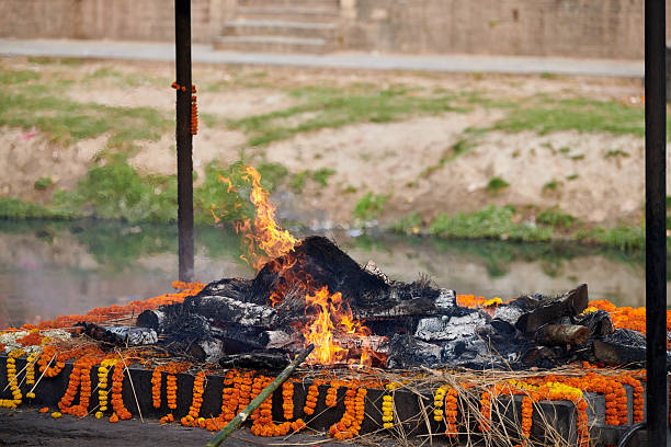 istock Smoldering funeral pyre for cremation ceremony at Pashupatinath Temple complex, Nepal 2231658620