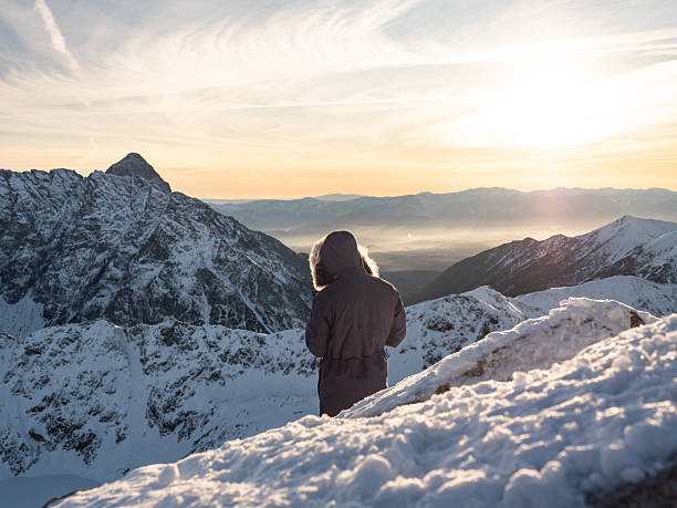 istock A hiker watches the sunset in the mountains. 2231659557
