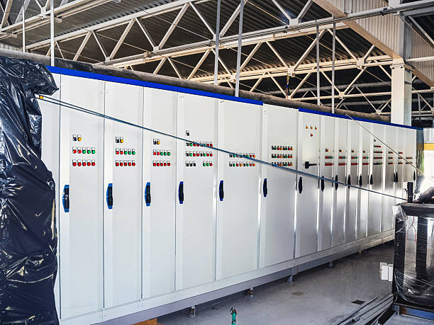 istock A large industrial control panel with numerous switches and buttons inside a facility. 2231681511