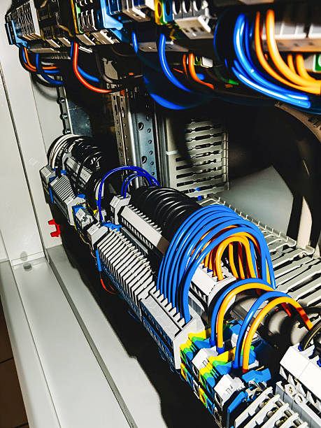 istock A detailed view of an electrical panel, showcasing complex wiring and circuits. 2231681577