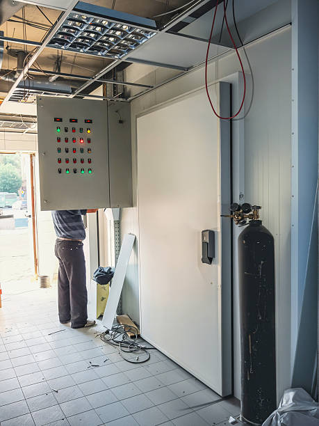 istock An electrician is installing an electrical panel in a commercial space. 2231681601