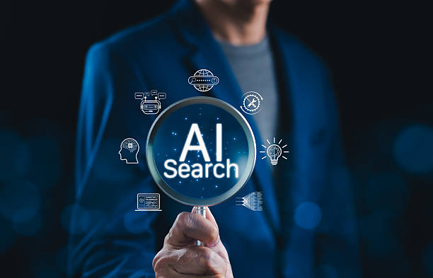 istock AI Search Engine Technology and Innovation Concept. Businessman holding magnifying glass with AI search text, icons of artificial intelligence, chatbot, big data, representing AI-driven search tech. 2231685026