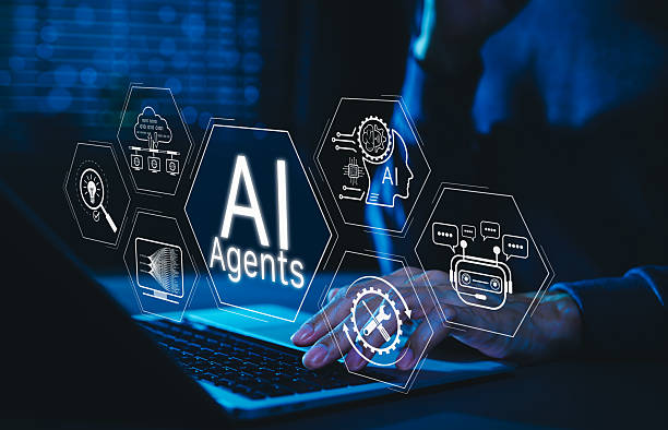 istock AI agent technology for automation and virtual assistance. Man using laptop with AI agents icons, smart assistant, artificial intelligence elements, automated, chatbot, and intelligent systems. ML, DL 2231685578