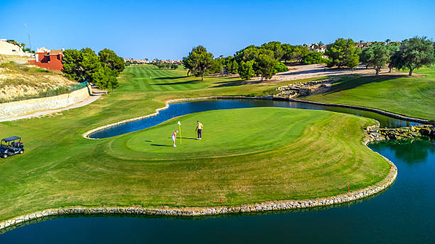 istock Golfers enjoying a scenic golf course landscape 2231696328