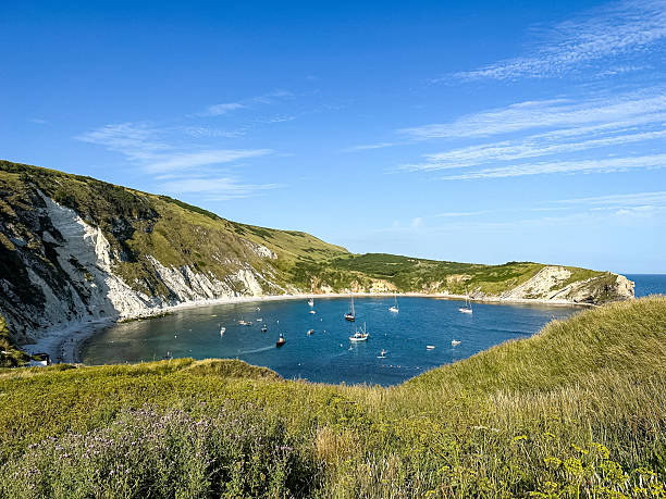 istock Lulworth Cove and beach view in Dorset, UK 2231700230