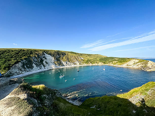 istock Lulworth Cove and beach view in Dorset, UK 2231700364