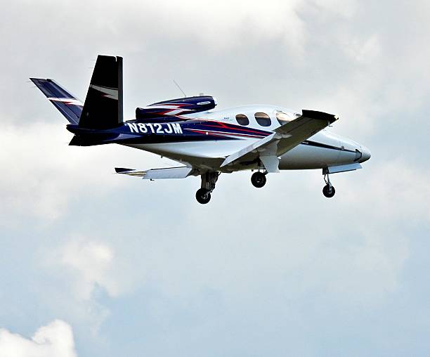 Ft. Lauderdale, Broward County, Florida, USA, August 17, 2025. A Cirrus fixed wing single engine (7 seats / 1 engine) N812JM approaching the Ft. Lauderdale Executive Airport.