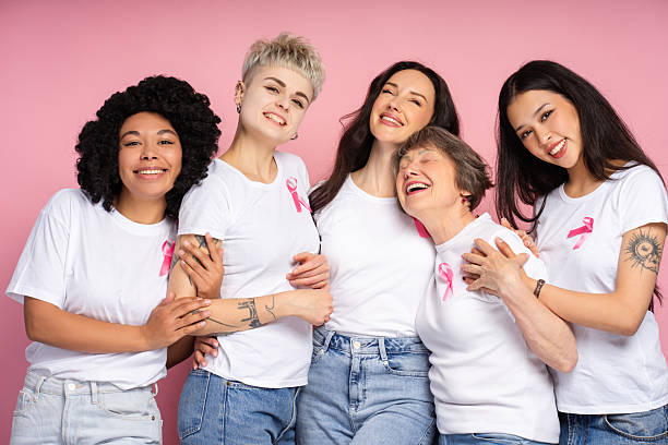 istock Diverse multinational women embracing and supporting breast cancer awareness 2231702804