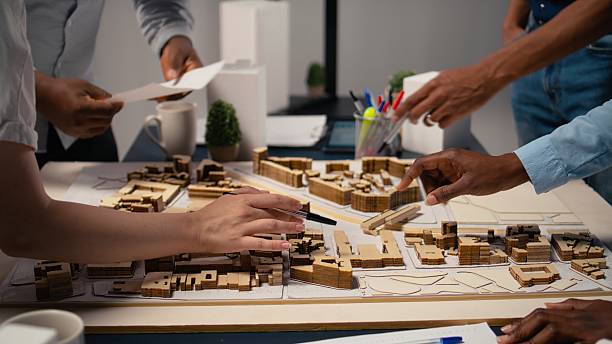 istock Close up of engineers team creating the property layout for site preparation 2231704270