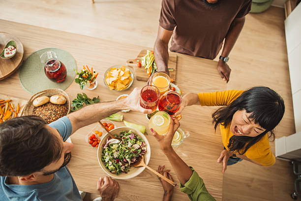 istock Friends preparing a meal together 2231705212
