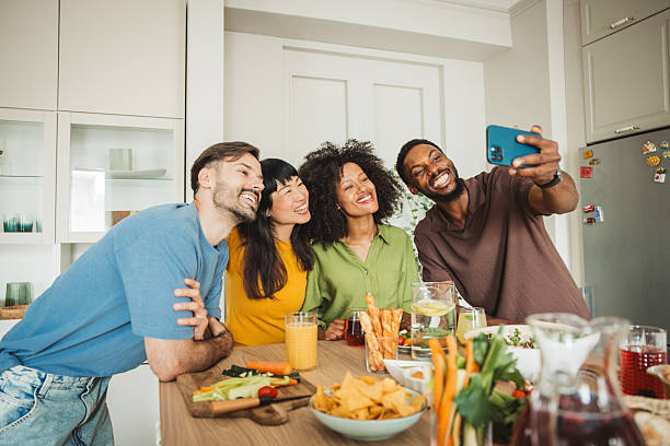 istock Friends preparing a meal together 2231705222