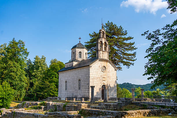 istock The historic Cetinje Monastery in Montenegro. Its ancient stone architecture and bell tower stand amidst green trees, a serene and timeless spiritual landmark 2231706821
