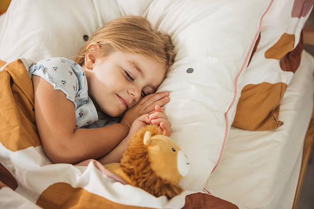 istock Adorable little girl sleeping 2231710225