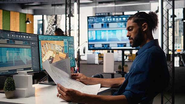 istock Middle eastern male developer creating property layout with furniture 2231711523