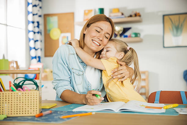 istock Daughter with mother doing homework 2231711759