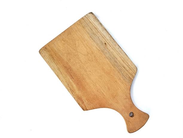 istock Wooden cutting board isolated on white background 2231718965