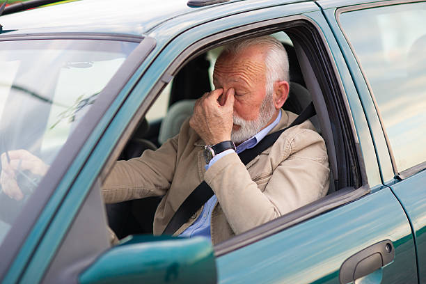 istock Tired senior man stuck in traffic jam 2231724042