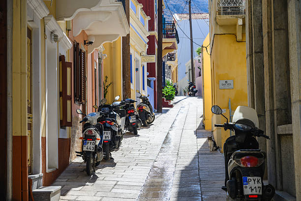 View up narrow street in old town, colourful streets of Symi, Greek Islands