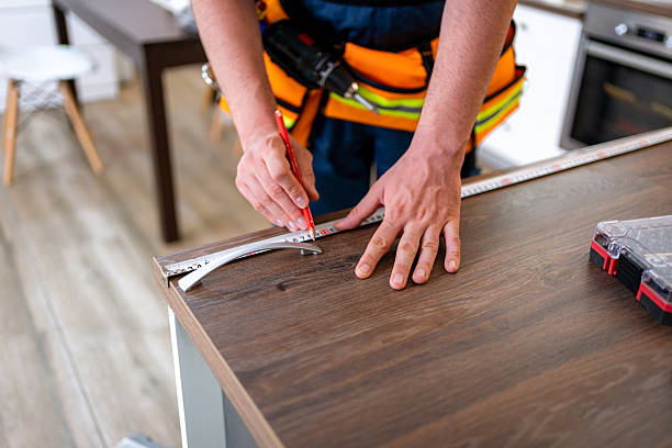 istock Measuring and marking a wooden surface for precise cuts in home renovation project 2231729919