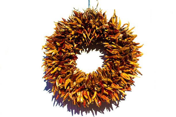 istock Santa Fe Style: Chili Pepper Ristra Wreath, White Background 2231731124