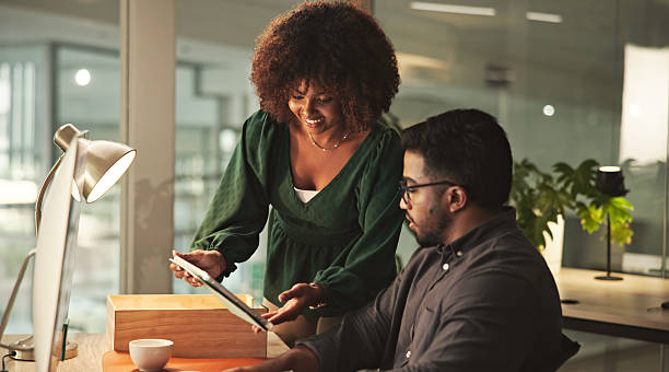 istock Collaborative Colleagues Engaged in a Productive Work Discussion in a Modern Office 2231732824