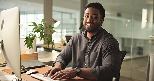 istock Confident Professional Working at Desk in Modern Office Space 2231732903