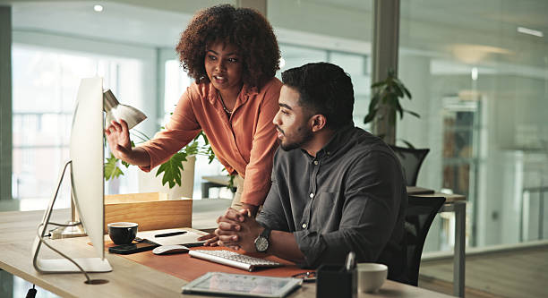 istock Professional Collaboration Between Coworkers in a Modern Office Setting 2231732906