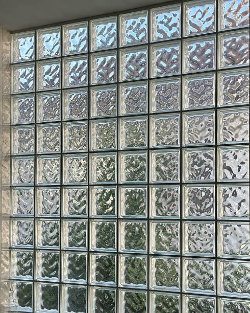 istock Sunlight through glass block wall: architectural detail for inte 2231739809
