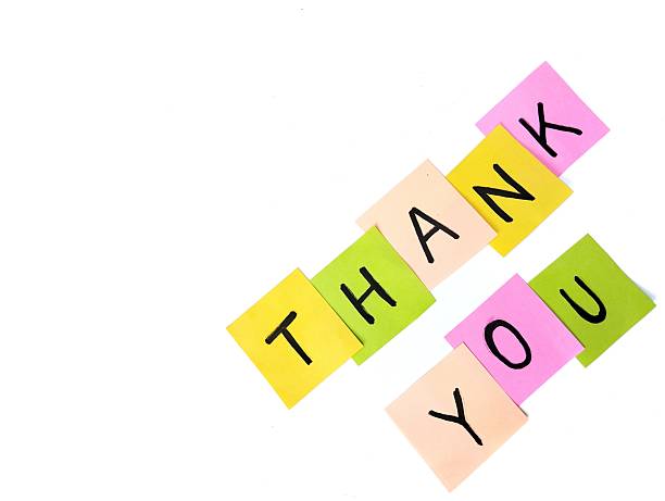 istock Thank you message on colorful note paper isolated on white background 2231741990