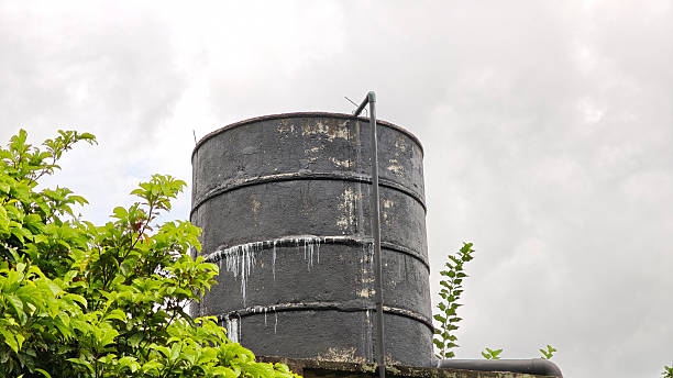 Elevated Water Tower Against Blue Sky