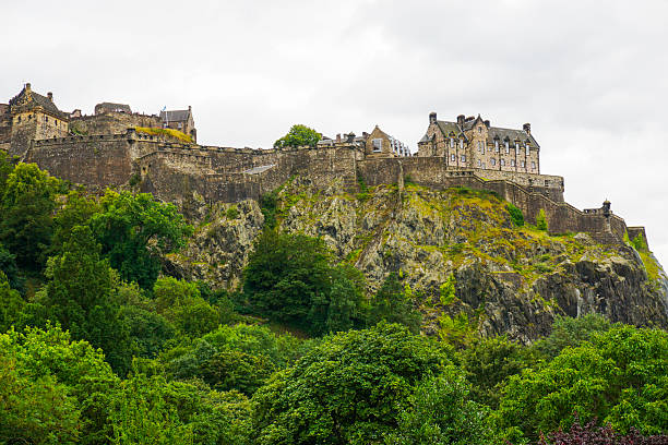 Edinburgh, Scotland, United Kingdom - April 27, 2022: Visitors mingle at the entrance to Edinburgh Castle in Edinburgh, Scotland.