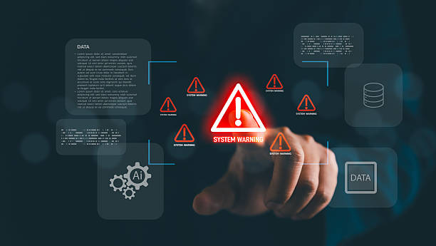 istock Hand pointing at glowing system warning alert with data and AI icons in digital interface, symbolizing cybersecurity risk, data protection, error notification, and system security breach. AI security 2231746696