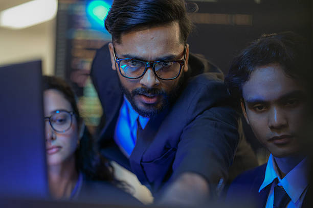 istock A senior AI architect mentors a diverse team as they debug a complex neural network. Intense, focused collaboration on developing the future of Artificial General Intelligence (AGI). 2231764687