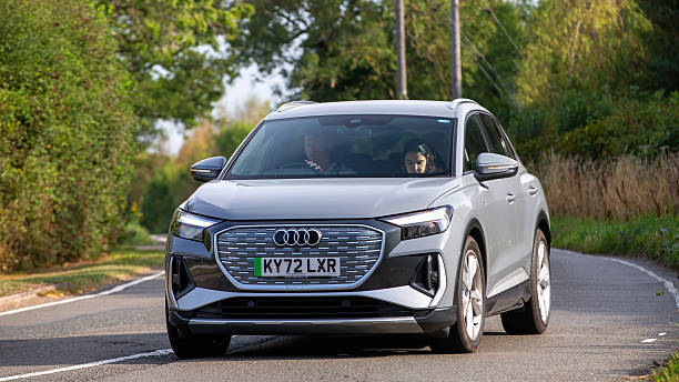 Whittlebury,Norhants,UK - Aug 23rd 2025:  2022 Audi Q4 E-Tron electric SUV car driving on a British road