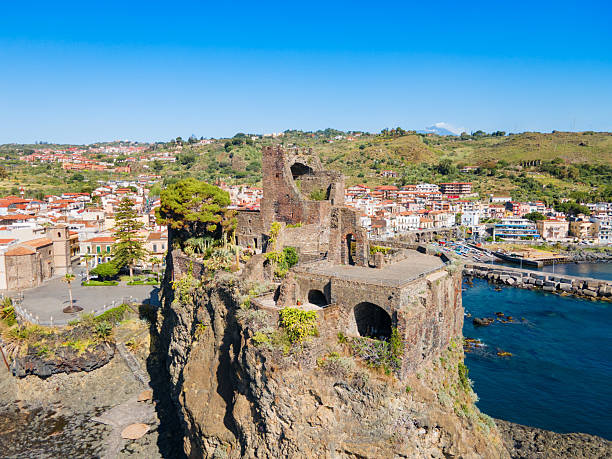 Castello Normanno or Norman Castle aerial panoramic view in Aci Castello. Aci Castello is a town in Catania region in Sicily, Italy.