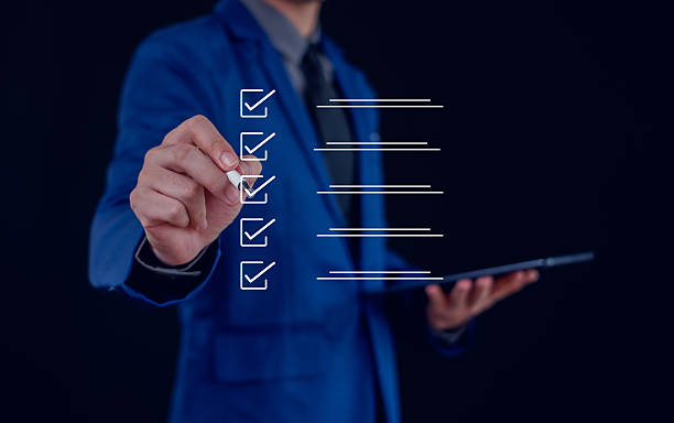 istock Businessman mark checkboxes, Survey form, check marks on checklist,Checklist concept. 2231775223